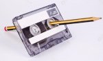 15095588-cassette-tape-with-pencil-to-rewind-Stock-Photo.jpg